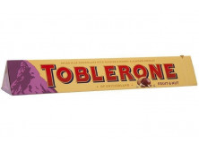 Шоколад "Toblerone" молочний з родзинками і нугою, 100г